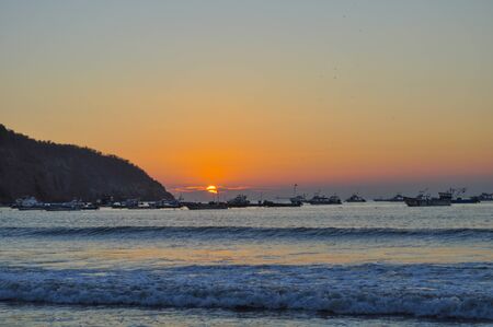 Fishing boats at Sunset in Puerto Lopez, Ecuadorの写真素材
