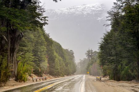Route with Snowcaped andes mountains background in Neuquen, Patagonia, Argentinaの写真素材