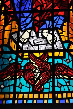 OSORNO, CHILE - JUNE 21, 2016: Stained glass depicting an angel in the Catholic Cathedral, San Mateo Apostol in Osorno, Chileのeditorial素材
