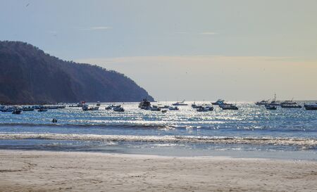 Fishing boats in the coast of Puerto Lopez, Ecuadorの写真素材