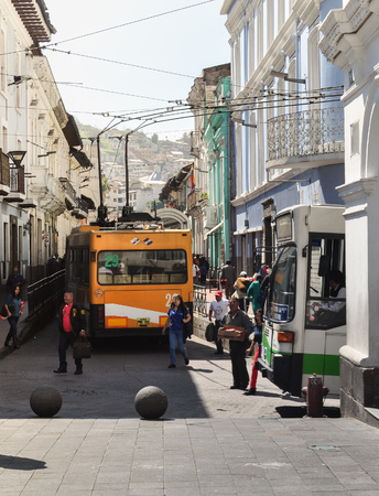 QUITO, ECUADOR - MARCH 14, 2016:  A metro bus transport is seen in the streets of Quito, Ecuador. Metro bus is one of the main public transport in Latin Americaのeditorial素材