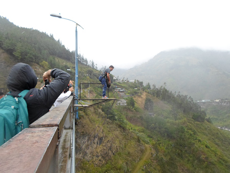 BANOS, ECUADOR - MARCH 25, 2016:  Unidentified people at bridge jumping (puenting) on San Francisco Bridge on February 26, 2014 in Banos, Ecuador. Banos is popular for its outdoor activities such as bridge jumping. The jump from this bridge is 45 metersのeditorial素材