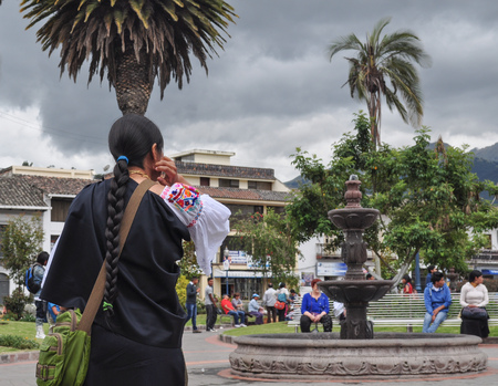OTAVALO, ECUADOR - MARCH 23, 2016: Unidentified Ecuadorian woman at the Otavalo Market. 71,9% of Ecuadorian people belong to the Mestizo ethnic groupのeditorial素材