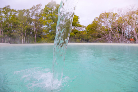 Relaxation pool in spa with waterfallの写真素材