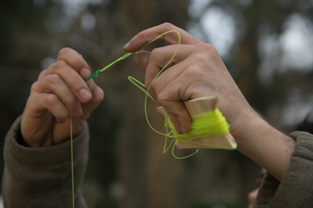 Man Preparing fishing line