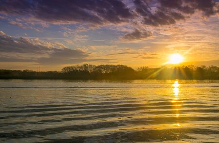 Beautiful Sunrise in the coast of Lujan River in San Fernando, Buenos Aires. San Fernando is the Argentine capital of Nauticalの写真素材