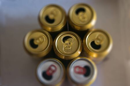 Top view of opened golden beer cansの写真素材