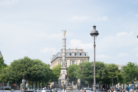 PARIS, FRANCE - JUNE 07, 2017:   Famous column with a golden angel at the Bastille square in Paris