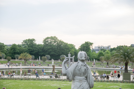 PARIS, FRENCH - JUNE 07, 2017:  People enjoy the day in the Luxembourg Garden in Paris. Luxembourg Palace is the official residence of the French Senateのeditorial素材