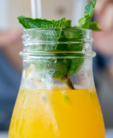 tropical cocktail with passion fruit and mintの写真素材