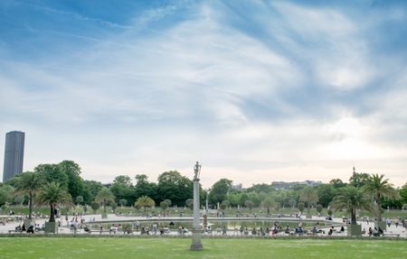 PARIS, FRENCH - JUNE 07, 2017:  People enjoy the day in the Luxembourg Garden in Paris. Luxembourg Palace is the official residence of the French Senateのeditorial素材