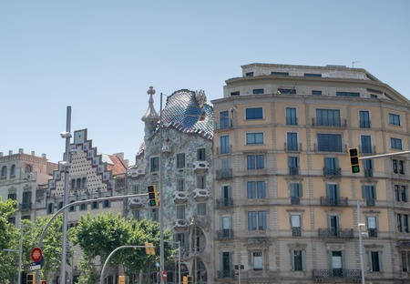 BARCELONA, SPAIN - AUGUST 8, 2017: People in Passeig de Gracia seat Casa Batllo made by Antoni Gaudi in 1877のeditorial素材