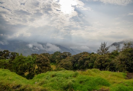 storm clouds over Tungurahua Volcano in Banos, Ecaudorの写真素材