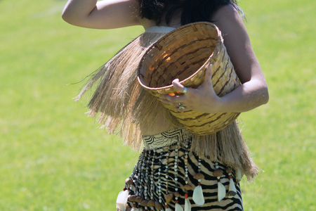 Portrait of young woman wearing traditional Peruvian clothing and dancing Anaconda dance, a musical genre typical of Amazon region of Peruの写真素材