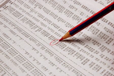 Pencil pointing over sheets accountsの写真素材