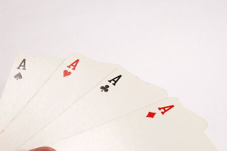 Poker cards with four A on white background