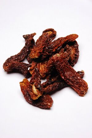 Sun Dried Tomato, Close Up against white backgroundの写真素材