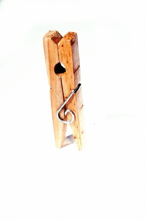 Close view of wooden Clothespin on white backgroundの写真素材