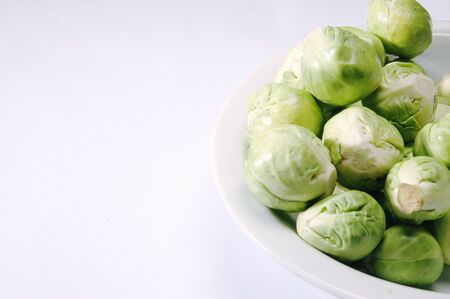Brussel Sprouts on Plate on white background 
の写真素材