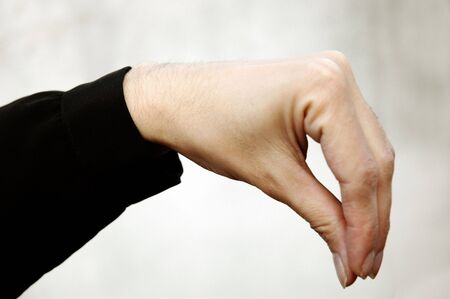 Hand Sign performing symbol languageの写真素材