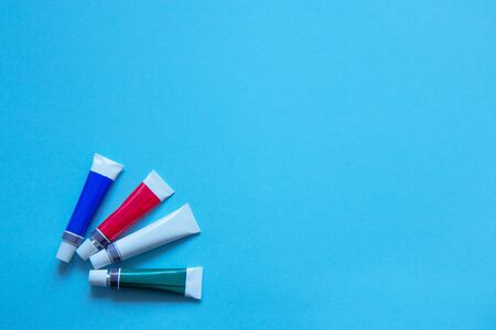 Set of stationery items on blue background. Flat layの写真素材