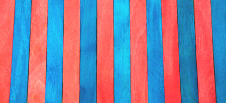 Colorful Ice Cream Stick. Red and blue color. Abstract wooden sticks background. Colorful rainbow...