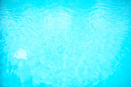 Blue ripped water in swimming poolの写真素材