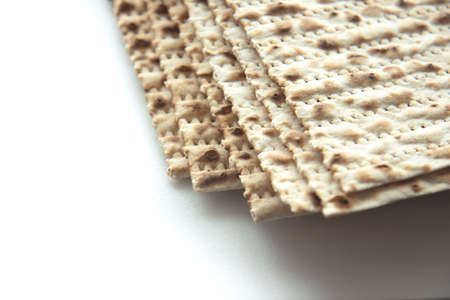 Traditional Jewish kosher matzo for Passover. Set with Passover matzos on white background. Pesach...