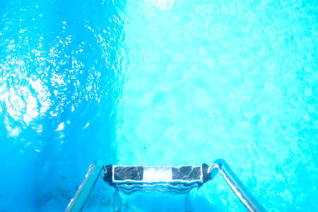 Blue ripped water in swimming pool. Surface of blue swimming poolの写真素材