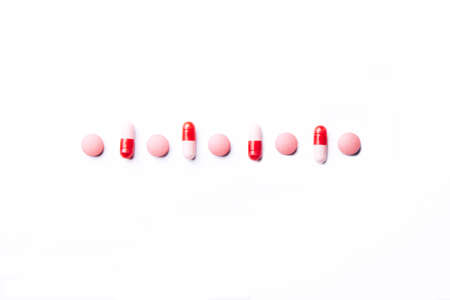 Dietary supplements and pills for dieting. Vitamin tablets on a white background. Medical concept....