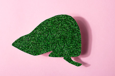 Model of a human liver. Conceptual image of green grass shaped like human liverの写真素材