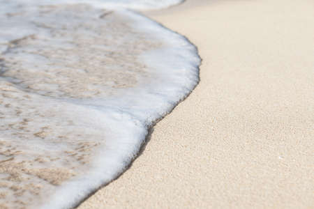 Turquoise water of the ocean and sandの写真素材