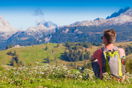 Hiker on the top of the mountains at Dolomites, South Tyrol. Italy, Europeの写真素材