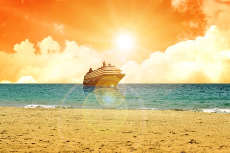 A cruise ship near the coast during sunset の写真素材