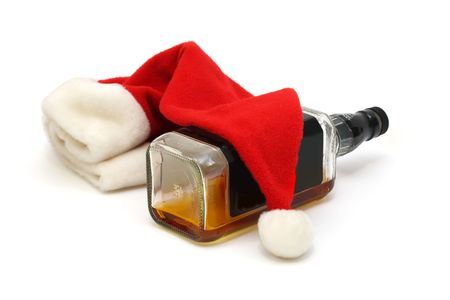 bottle of whiskey and santa cap の写真素材