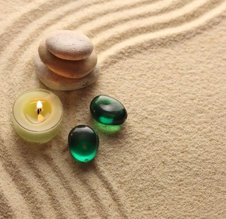 candle light and stones の写真素材