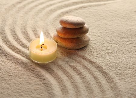 stones and light candleの写真素材