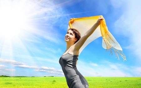  beautiful woman under blue skyの写真素材