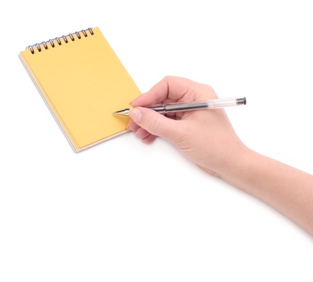 hand with pen and paperの写真素材