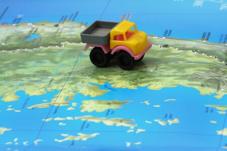 small car on mapの写真素材