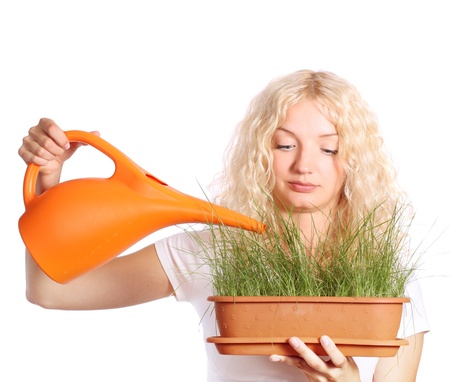 woman taking care of grassの写真素材