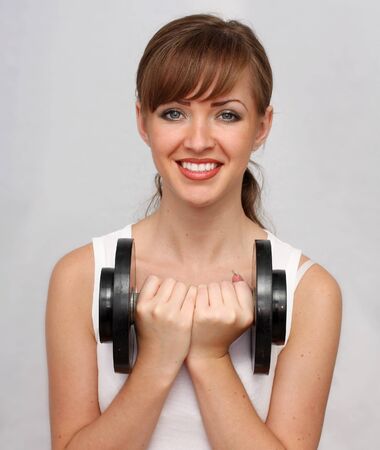 woman with big dumbbellの写真素材