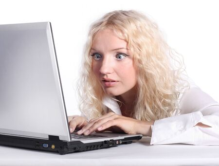 young blond woman with laptopの写真素材