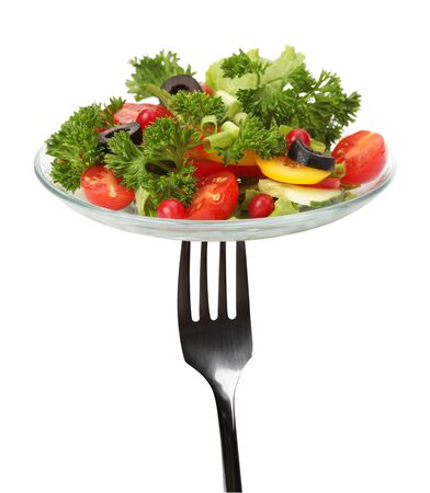 fork with fresh saladの写真素材