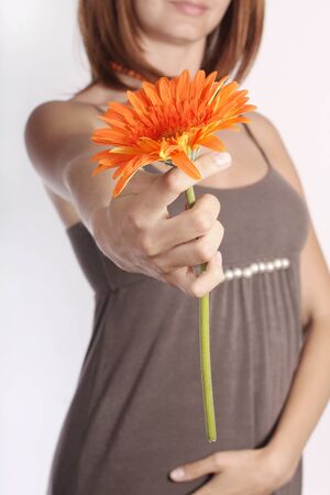 girl gives a flowerの写真素材