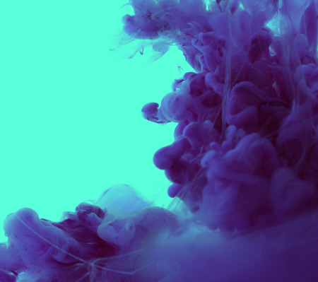 Acrylic colors and ink in water. Abstract background.