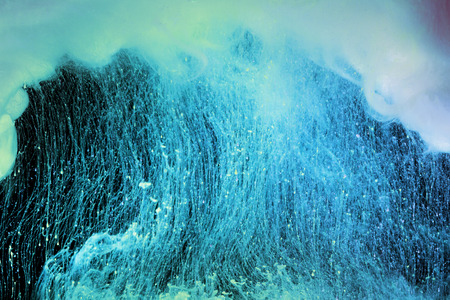 Acrylic colors in water. Ink blot. Abstract background.