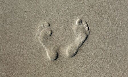 Human footprint in the sand. Nature background.の写真素材