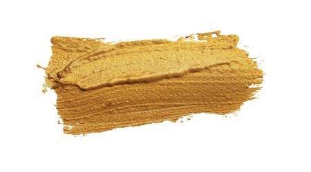 Gold (bronze) glittering color smear brush stroke stain blot on white background. Abstract Paint texture.の写真素材