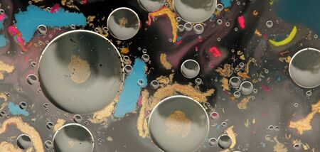 Macro Abstract texture background. Acrylic color in water and oil.の写真素材